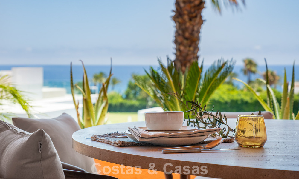 Modernly renovated apartment with stunning sea views for sale just steps from the beach on Marbella's Golden Mile 783813