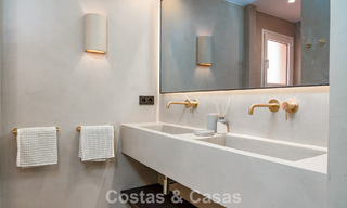 Modernly renovated apartment with stunning sea views for sale just steps from the beach on Marbella's Golden Mile 783822 