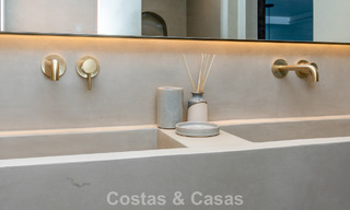 Modernly renovated apartment with stunning sea views for sale just steps from the beach on Marbella's Golden Mile 783828 
