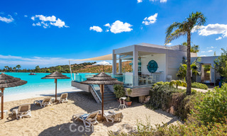 Move-in ready, 2-bedroom garden apartment for sale in an exclusive complex near a large blue lagoon on the Costa del Sol 783969 