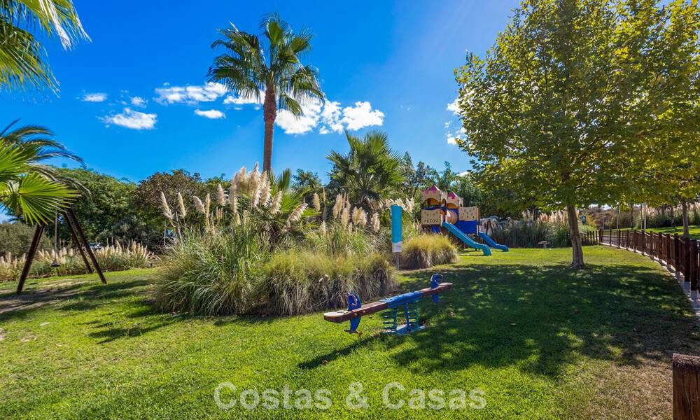 Move-in ready, 2-bedroom garden apartment for sale in an exclusive complex near a large blue lagoon on the Costa del Sol 783976