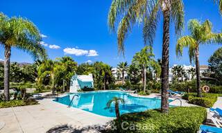 Move-in ready, 2-bedroom garden apartment for sale in an exclusive complex near a large blue lagoon on the Costa del Sol 783977 