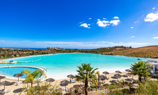 Move-in ready, 2-bedroom garden apartment for sale in an exclusive complex near a large blue lagoon on the Costa del Sol 783978 
