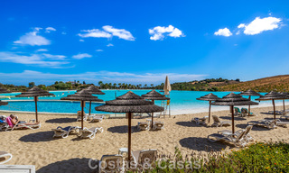 Move-in ready, 2-bedroom garden apartment for sale in an exclusive complex near a large blue lagoon on the Costa del Sol 783980 