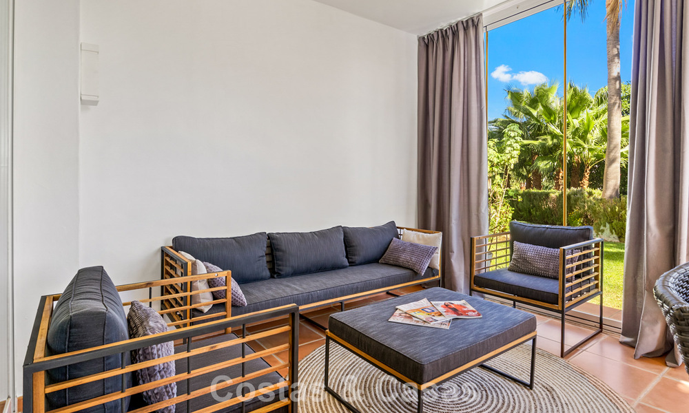 Move-in ready, 2-bedroom garden apartment for sale in an exclusive complex near a large blue lagoon on the Costa del Sol 783988