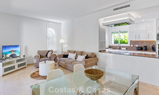 Move-in ready, 2-bedroom garden apartment for sale in an exclusive complex near a large blue lagoon on the Costa del Sol 783989 