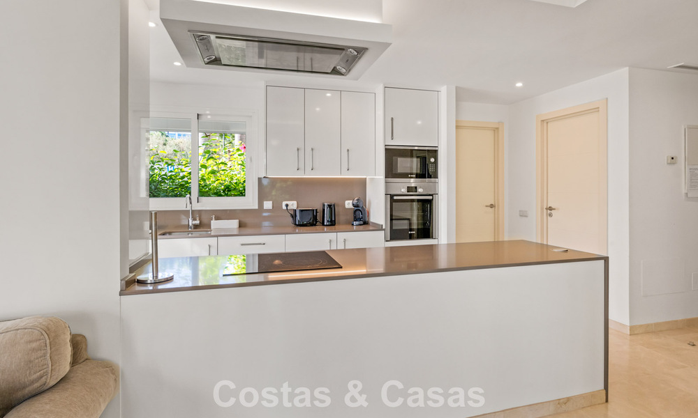 Move-in ready, 2-bedroom garden apartment for sale in an exclusive complex near a large blue lagoon on the Costa del Sol 783991