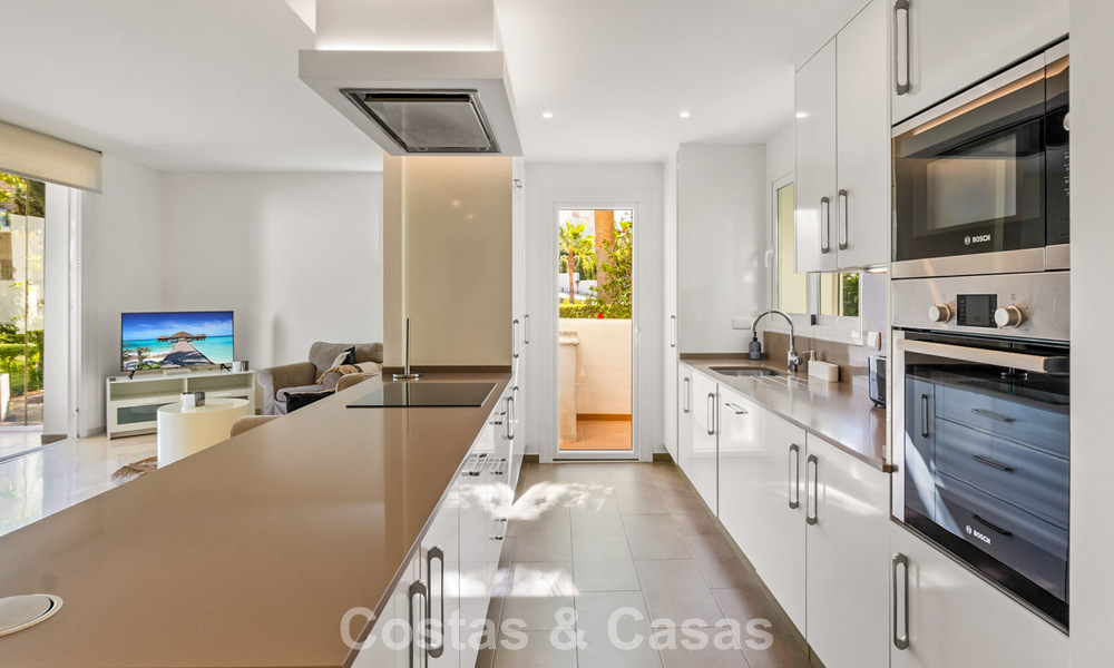 Move-in ready, 2-bedroom garden apartment for sale in an exclusive complex near a large blue lagoon on the Costa del Sol 783993