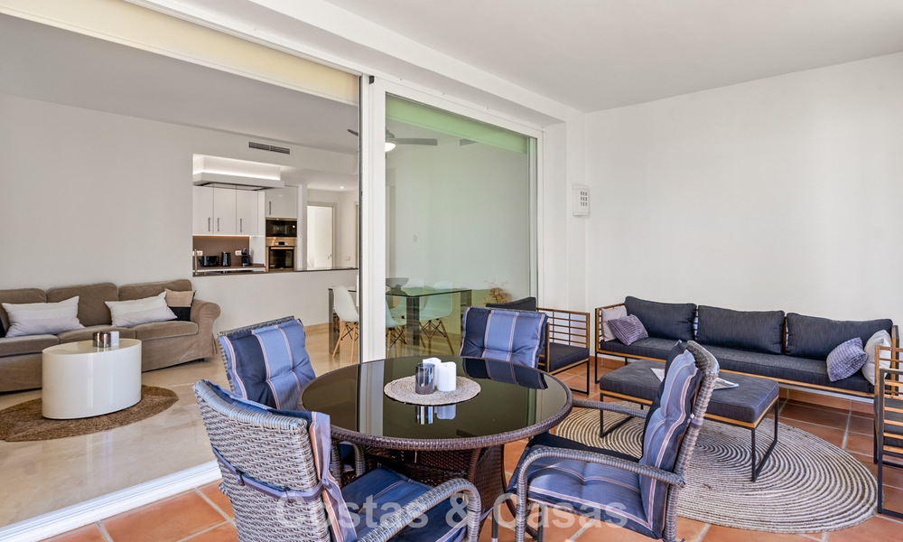 Move-in ready, 2-bedroom garden apartment for sale in an exclusive complex near a large blue lagoon on the Costa del Sol 783994