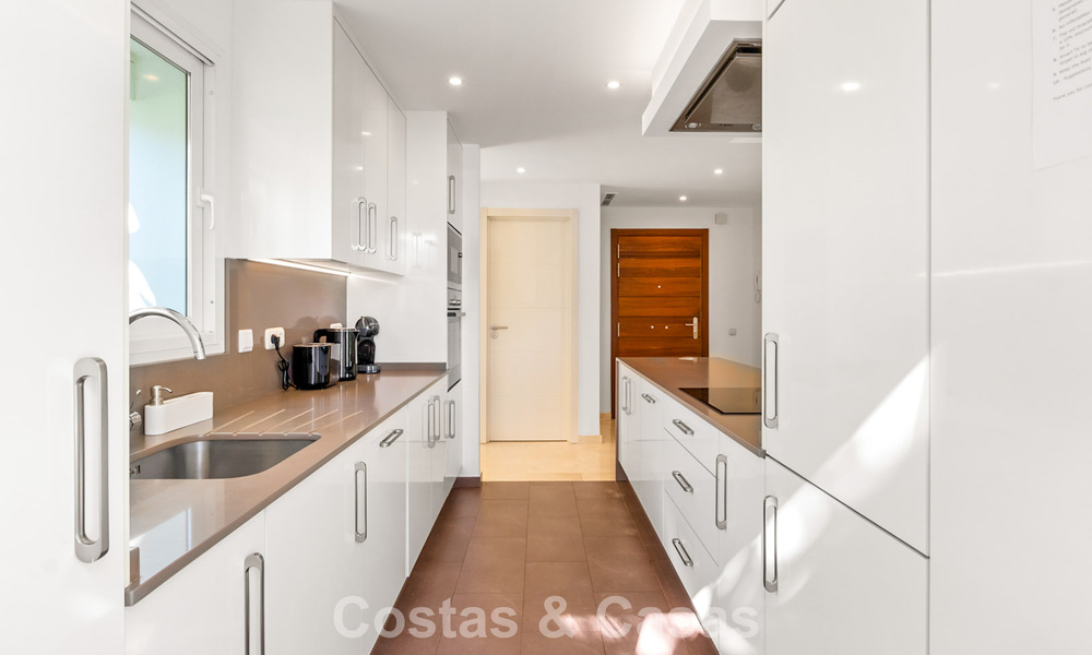 Move-in ready, 2-bedroom garden apartment for sale in an exclusive complex near a large blue lagoon on the Costa del Sol 783998