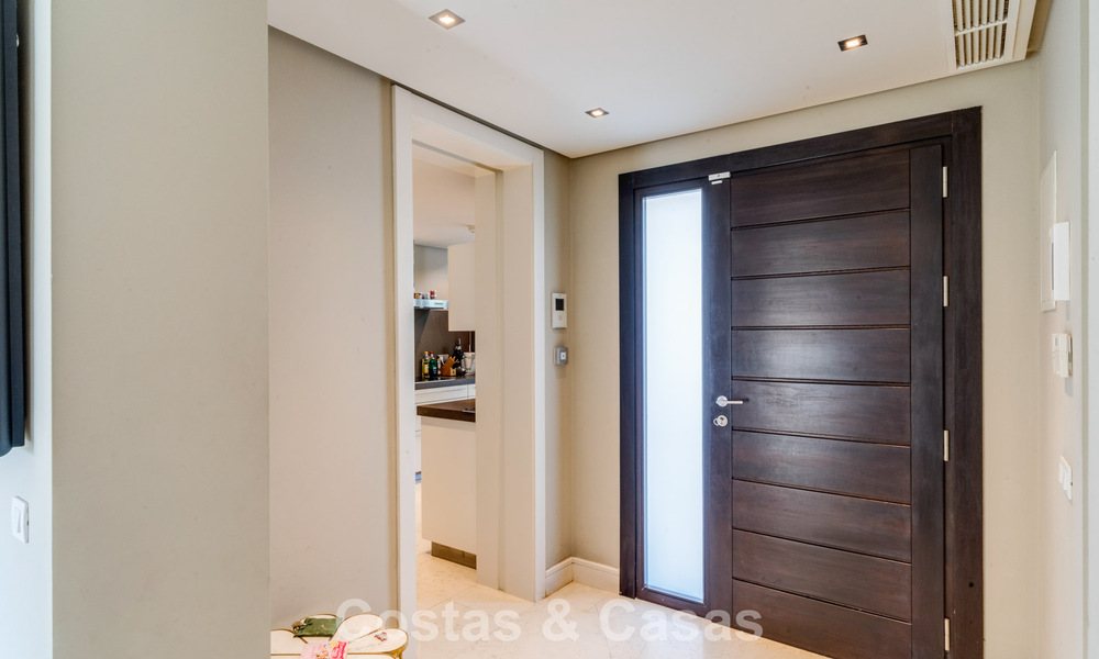 Stunning, modern, Mediterranean villa for sale in a secure, exclusive complex on Marbella's Golden Mile. 784300