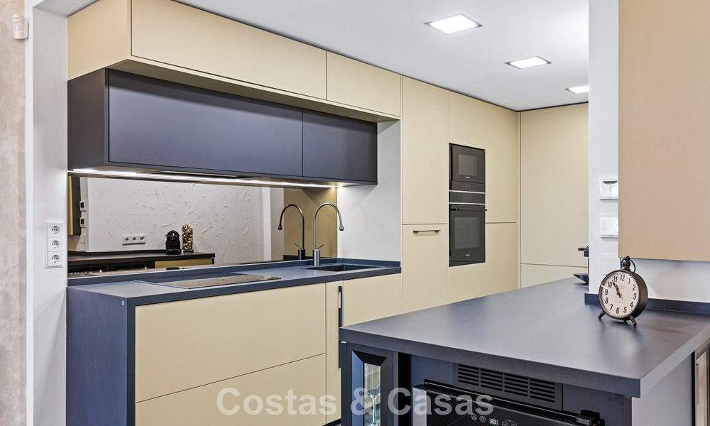 Modernized luxury apartment with panoramic sea views for sale in a golf resort in Marbella - Benahavis 784833