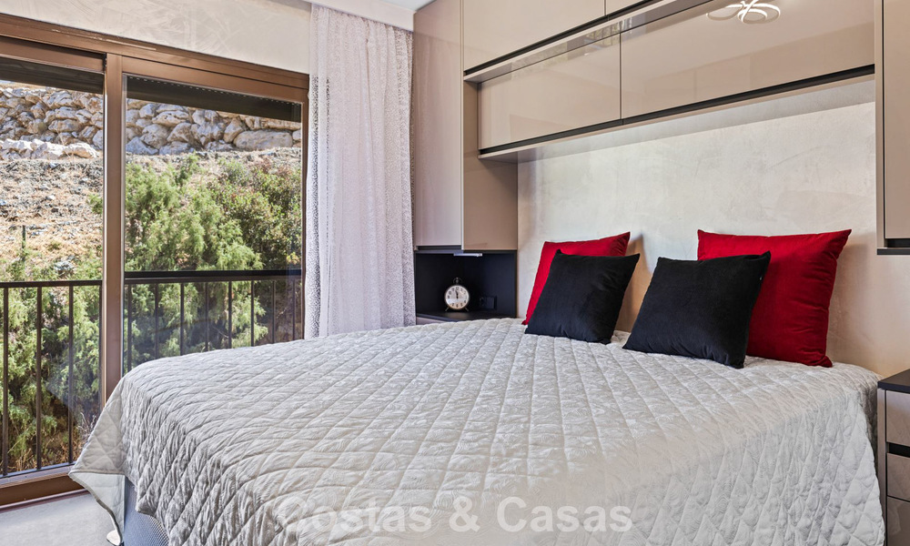 Modernized luxury apartment with panoramic sea views for sale in a golf resort in Marbella - Benahavis 784837
