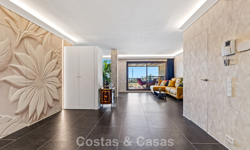 Modernized luxury apartment with panoramic sea views for sale in a golf resort in Marbella - Benahavis 784843