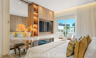 Luxury penthouse with sea views for sale in a gated beach complex on the New Golden Mile between Marbella and Estepona 785026 