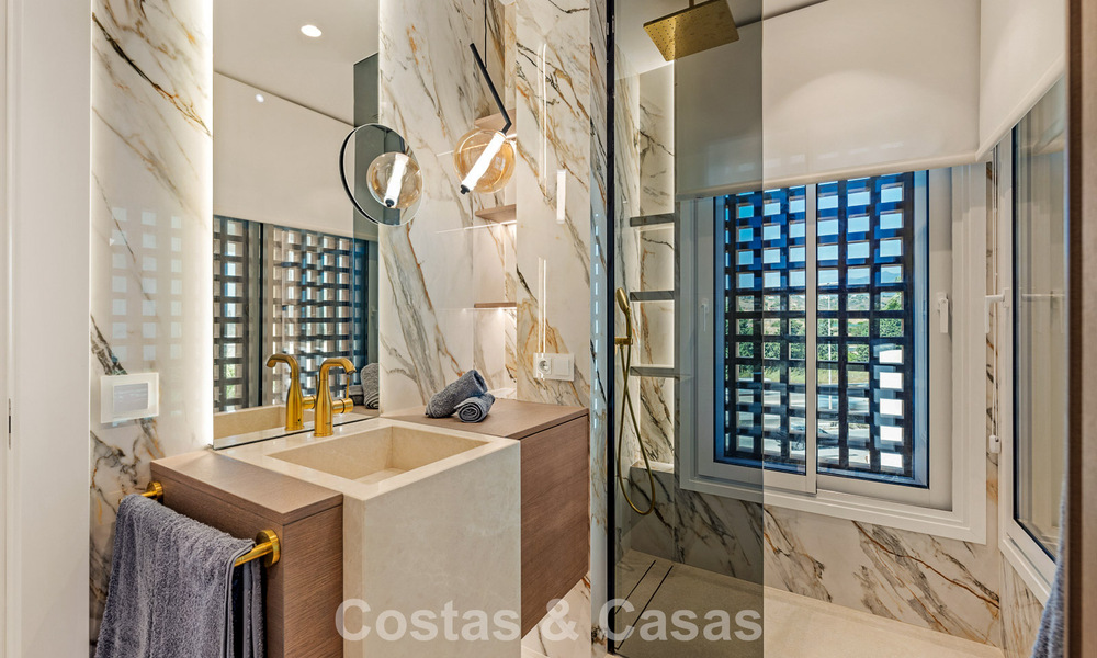 Luxury penthouse with sea views for sale in a gated beach complex on the New Golden Mile between Marbella and Estepona 785044