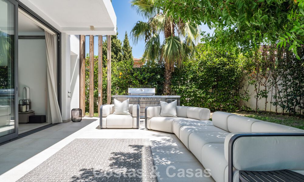 Modernist villa for sale in a private community surrounded by greenery, on the New Golden Mile between Marbella and Estepona 785369