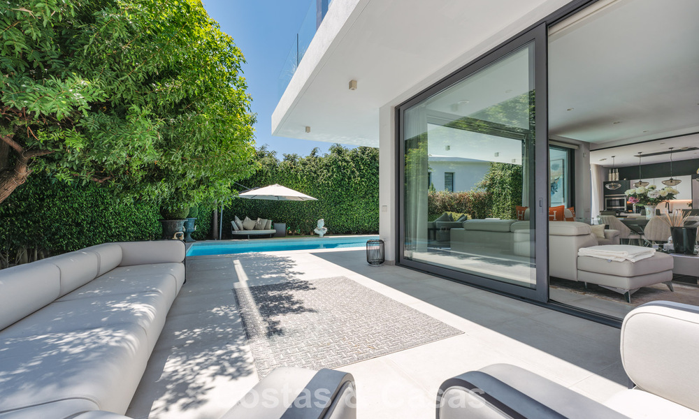 Modernist villa for sale in a private community surrounded by greenery, on the New Golden Mile between Marbella and Estepona 785370