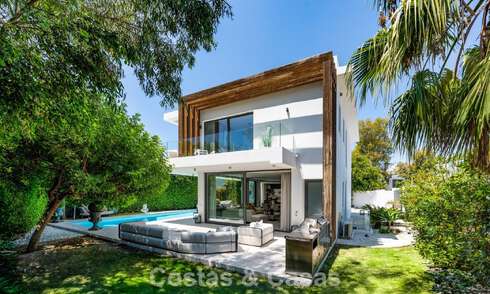 Modernist villa for sale in a private community surrounded by greenery, on the New Golden Mile between Marbella and Estepona 785371