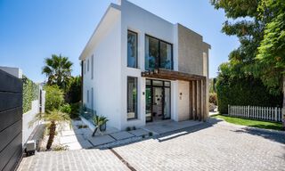 Modernist villa for sale in a private community surrounded by greenery, on the New Golden Mile between Marbella and Estepona 785373 