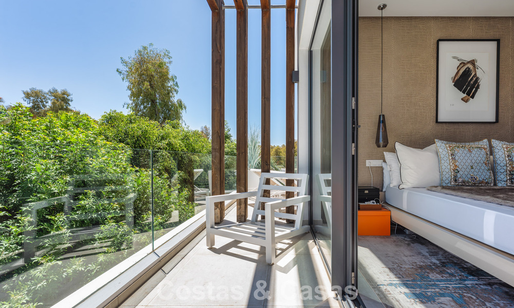 Modernist villa for sale in a private community surrounded by greenery, on the New Golden Mile between Marbella and Estepona 785374