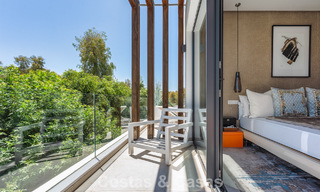 Modernist villa for sale in a private community surrounded by greenery, on the New Golden Mile between Marbella and Estepona 785374 