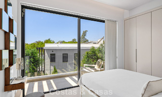 Modernist villa for sale in a private community surrounded by greenery, on the New Golden Mile between Marbella and Estepona 785377 