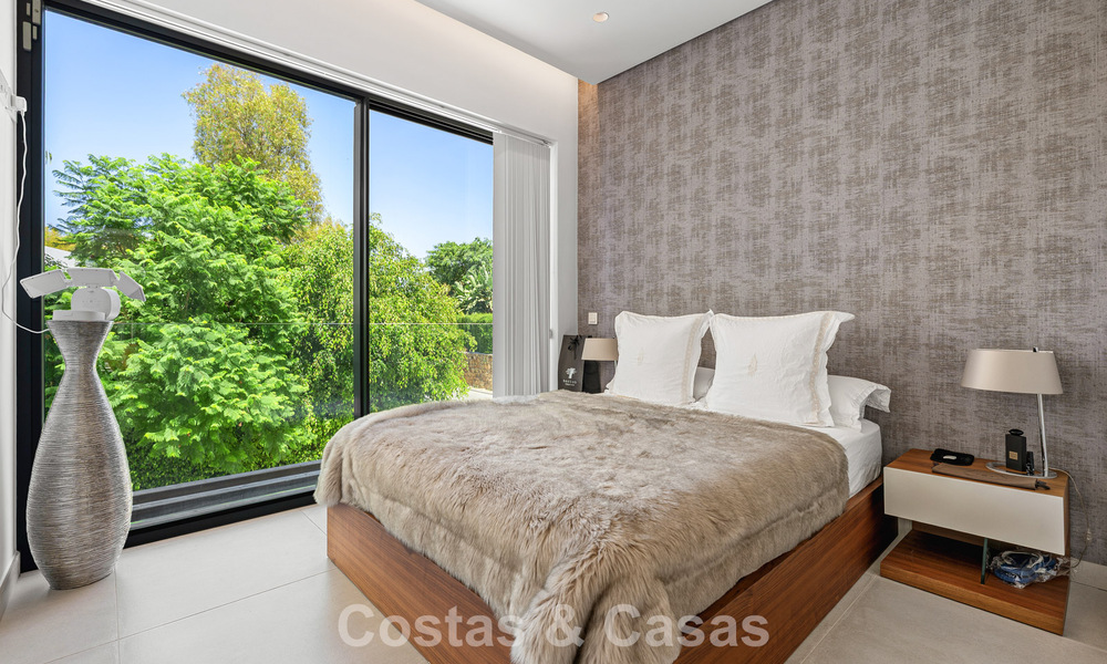Modernist villa for sale in a private community surrounded by greenery, on the New Golden Mile between Marbella and Estepona 785380