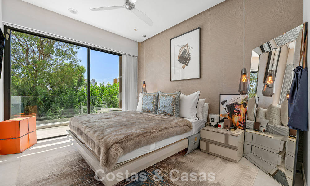 Modernist villa for sale in a private community surrounded by greenery, on the New Golden Mile between Marbella and Estepona 785382