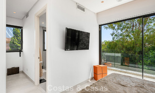 Modernist villa for sale in a private community surrounded by greenery, on the New Golden Mile between Marbella and Estepona 785383 