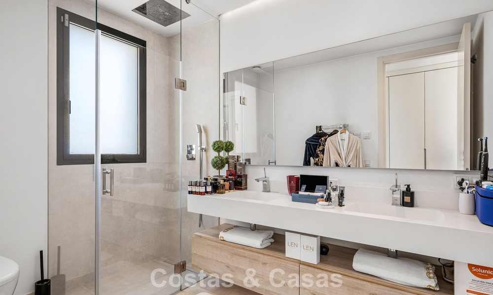 Modernist villa for sale in a private community surrounded by greenery, on the New Golden Mile between Marbella and Estepona 785384
