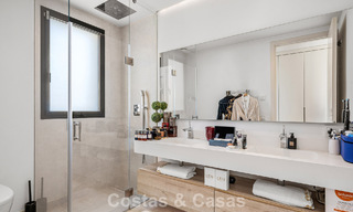 Modernist villa for sale in a private community surrounded by greenery, on the New Golden Mile between Marbella and Estepona 785384 