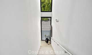 Modernist villa for sale in a private community surrounded by greenery, on the New Golden Mile between Marbella and Estepona 785386 