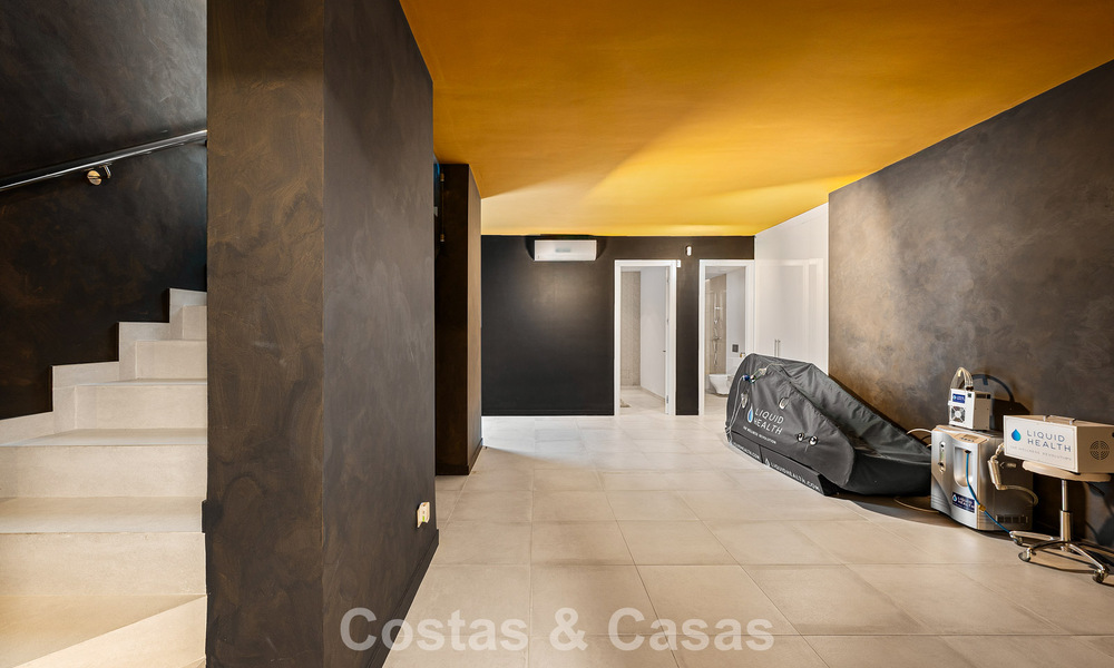 Modernist villa for sale in a private community surrounded by greenery, on the New Golden Mile between Marbella and Estepona 785387