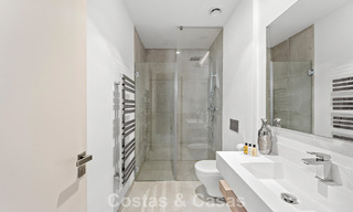 Modernist villa for sale in a private community surrounded by greenery, on the New Golden Mile between Marbella and Estepona 785389 