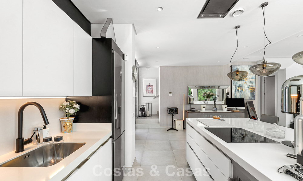 Modernist villa for sale in a private community surrounded by greenery, on the New Golden Mile between Marbella and Estepona 785392