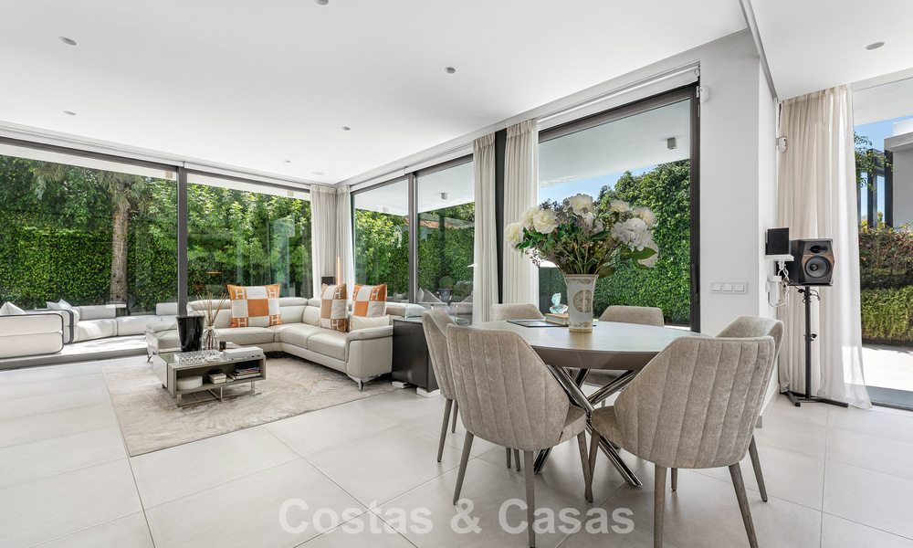 Modernist villa for sale in a private community surrounded by greenery, on the New Golden Mile between Marbella and Estepona 785394