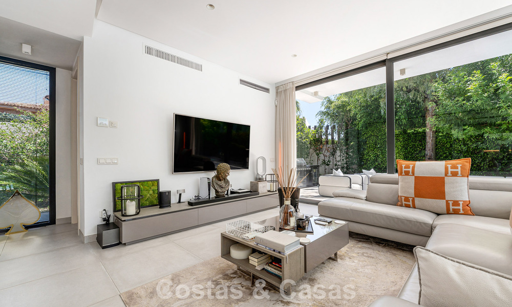 Modernist villa for sale in a private community surrounded by greenery, on the New Golden Mile between Marbella and Estepona 785395
