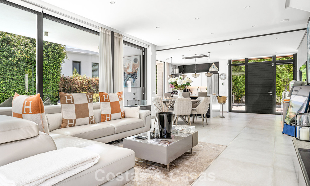 Modernist villa for sale in a private community surrounded by greenery, on the New Golden Mile between Marbella and Estepona 785396