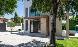 Modernist villa for sale in a private community surrounded by greenery, on the New Golden Mile between Marbella and Estepona 785397 