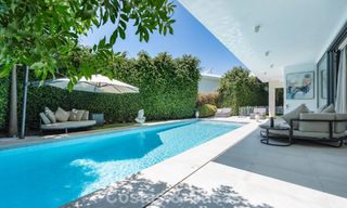 Modernist villa for sale in a private community surrounded by greenery, on the New Golden Mile between Marbella and Estepona 785398 