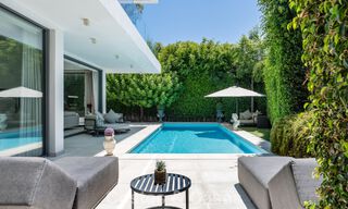 Modernist villa for sale in a private community surrounded by greenery, on the New Golden Mile between Marbella and Estepona 785399 