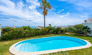 Charming properties for sale in a beachfront residential development near Estepona Town 808321 