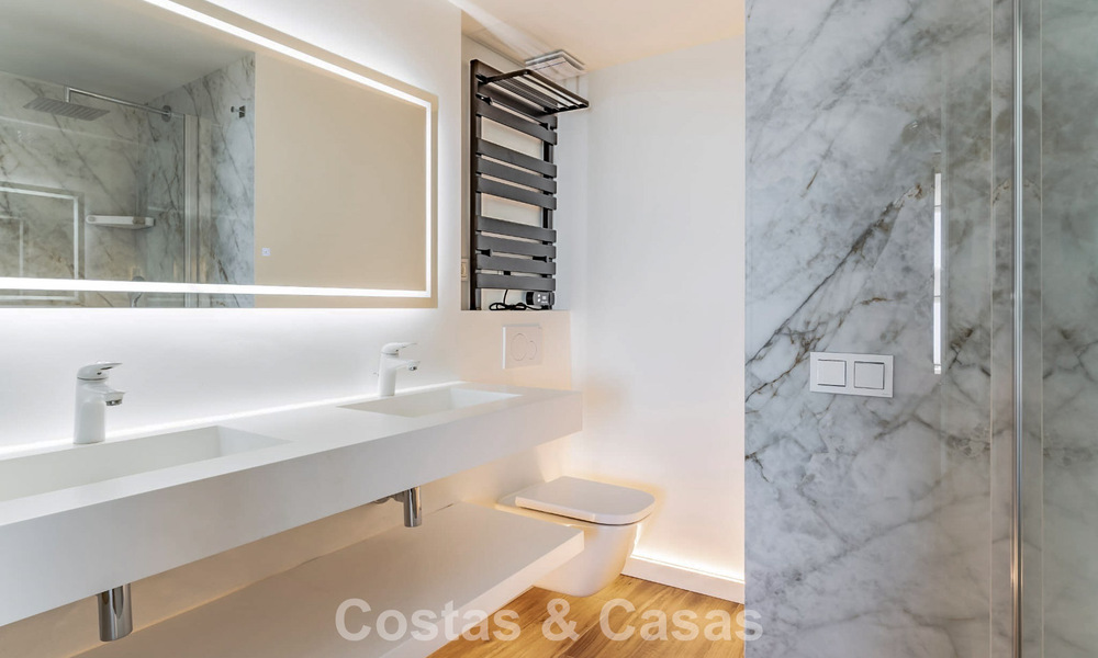Contemporary renovated 3-bedroom apartment with open sea views for sale on the east side of Marbella center 785507