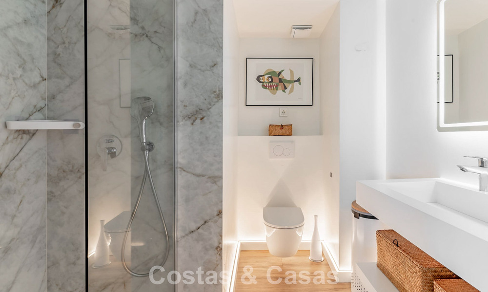 Contemporary renovated 3-bedroom apartment with open sea views for sale on the east side of Marbella center 785508