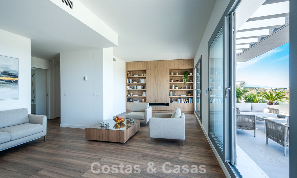 Move-in ready, brand new, modern, top-floor apartment for sale in a golf urbanization near Estepona town 785916