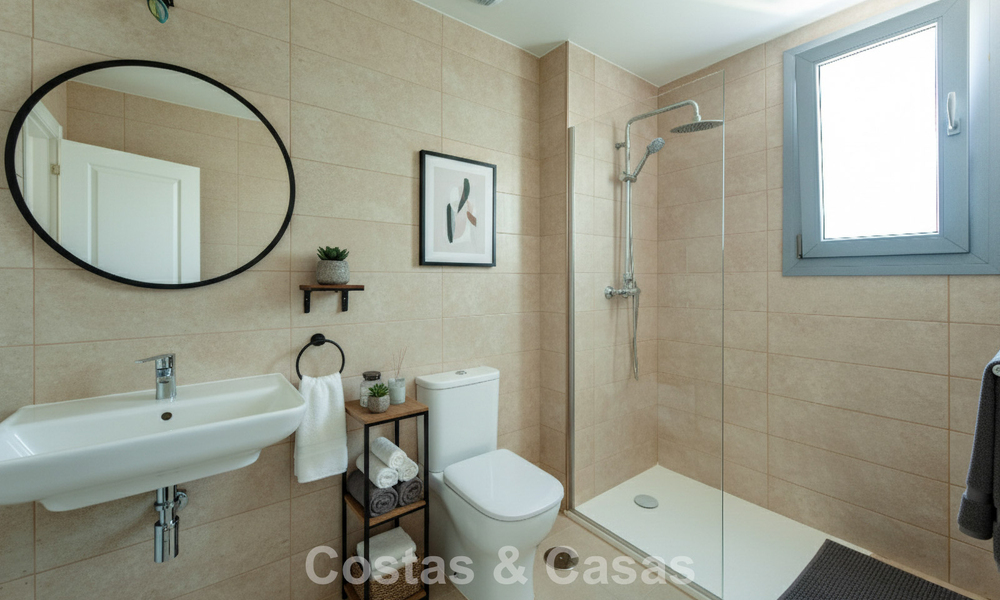Move-in ready, brand new, modern, top-floor apartment for sale in a golf urbanization near Estepona town 785920