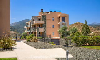 Ground floor corner apartment with a huge private garden for sale in a golf resort in the hills of Marbella - Benahavis 785880 