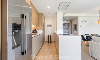 Ground floor corner apartment with a huge private garden for sale in a golf resort in the hills of Marbella - Benahavis 785886 