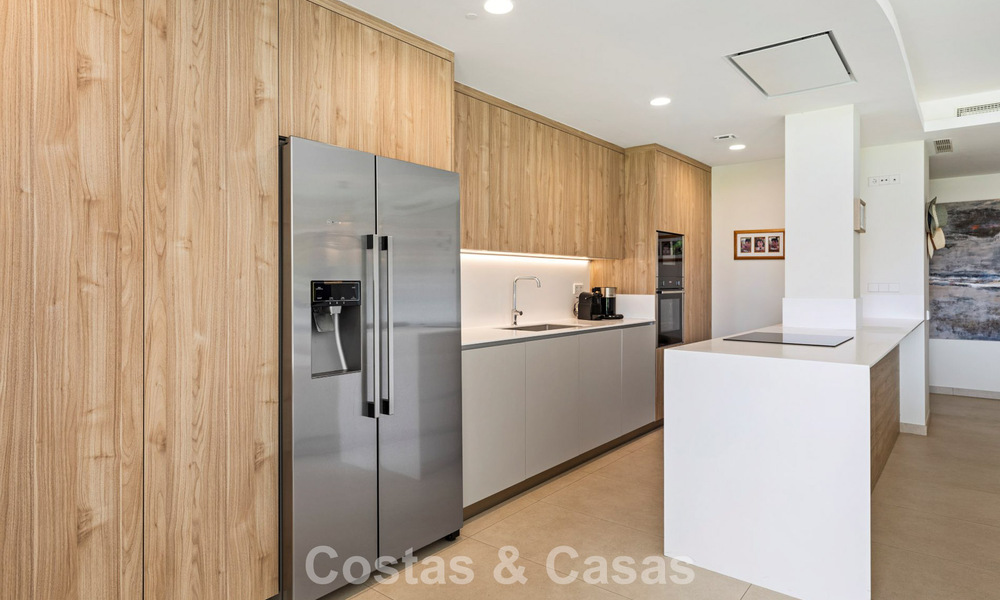 Ground floor corner apartment with a huge private garden for sale in a golf resort in the hills of Marbella - Benahavis 785896